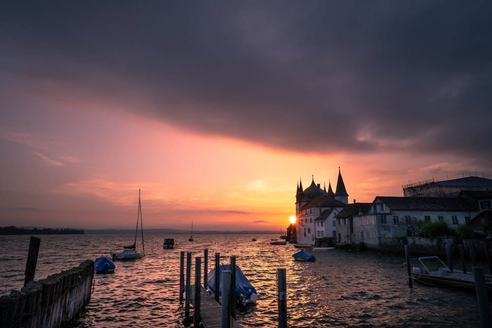 castle at body of water during golden hour time