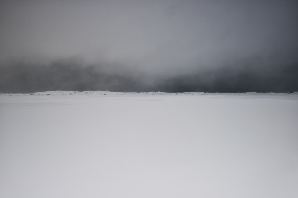 grayscale photography of snow horizon