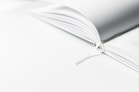 white book marker on book page