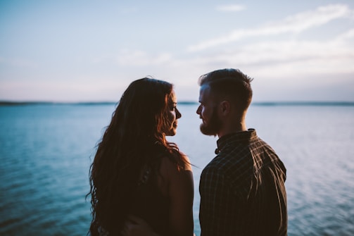 A couple reflecting on their relationship in a serene environment.