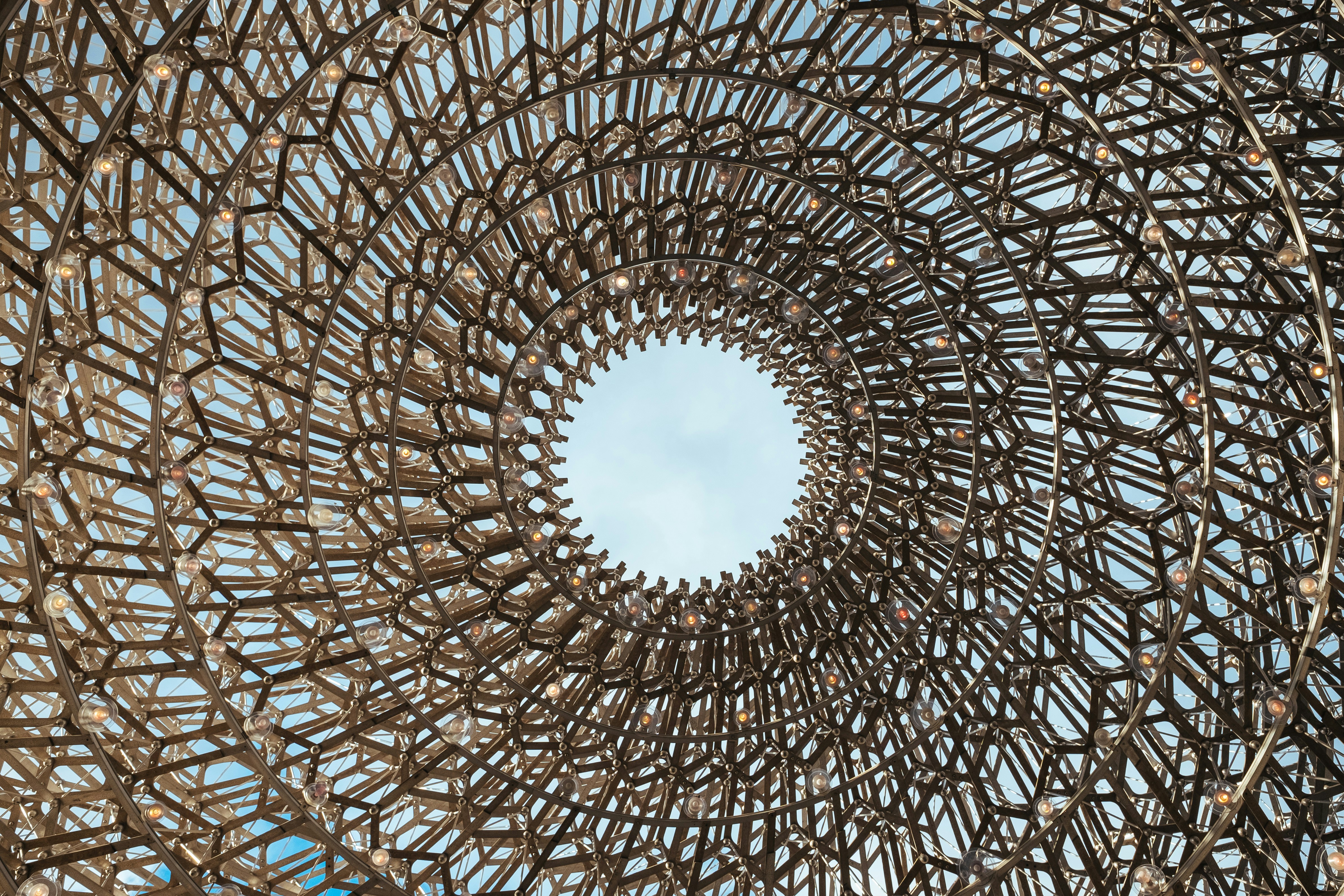 low-angle of brown metal structure during daytime