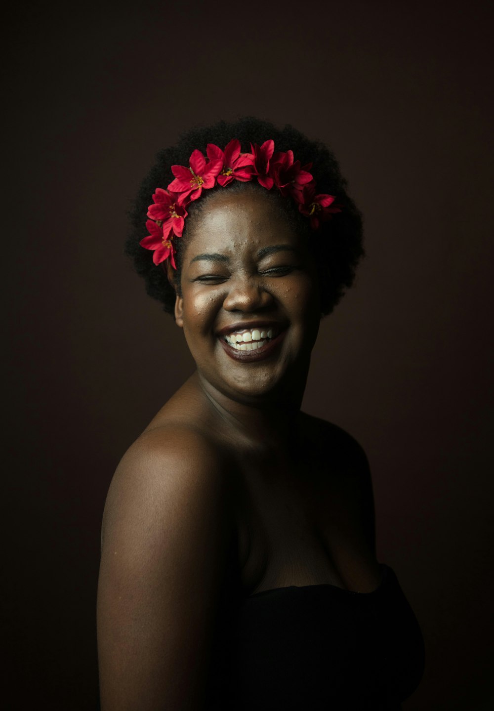 smiling woman wearing black top