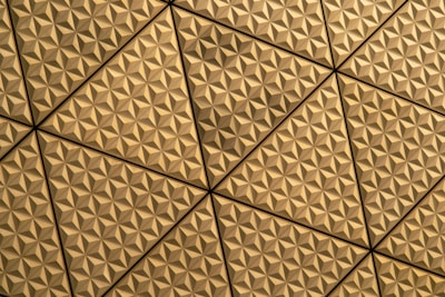 a close up of a ceiling with a pattern on it
