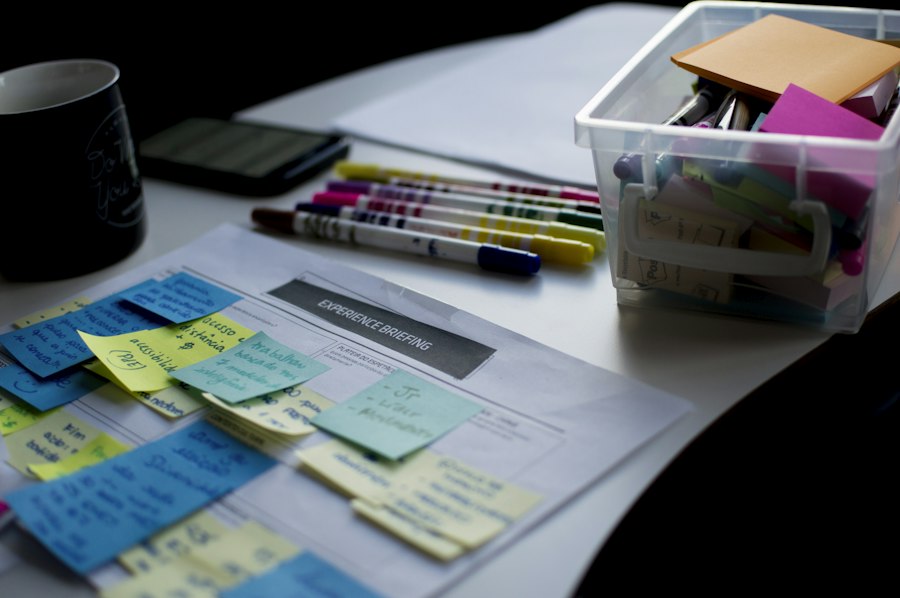 Sticky notes and markers laid out on a planning sheet