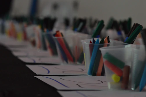 Close-up of colorful STEM kits neatly arranged on a lab table ready for a workshop.