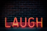 Laugh neon signage