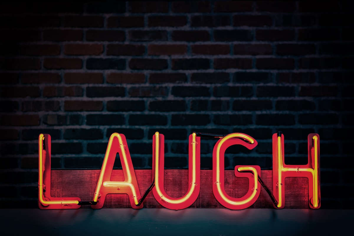 laugh neon sign