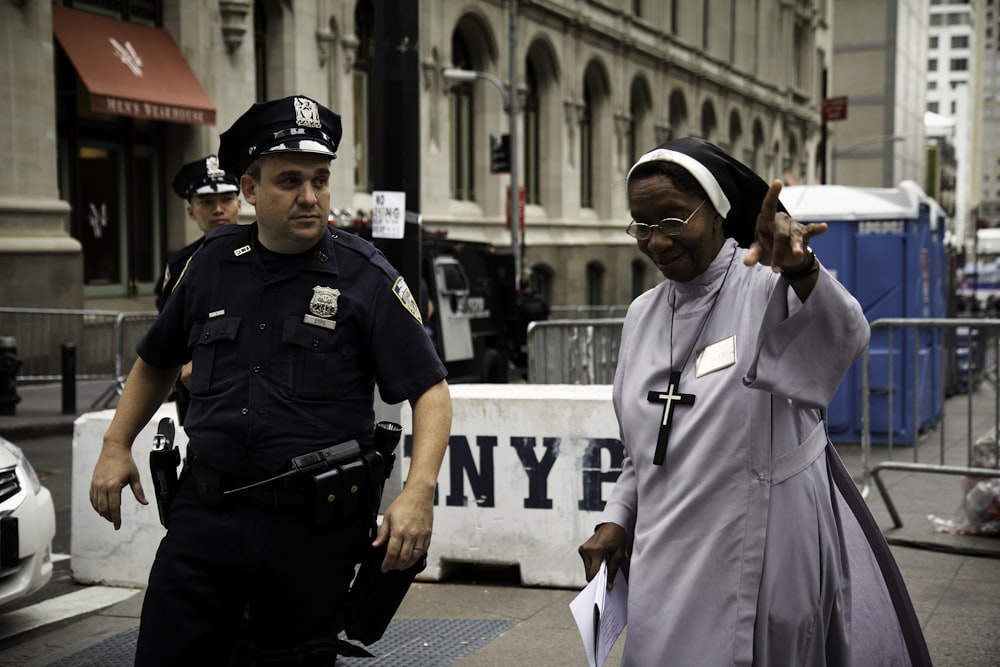 policeman assist a nun