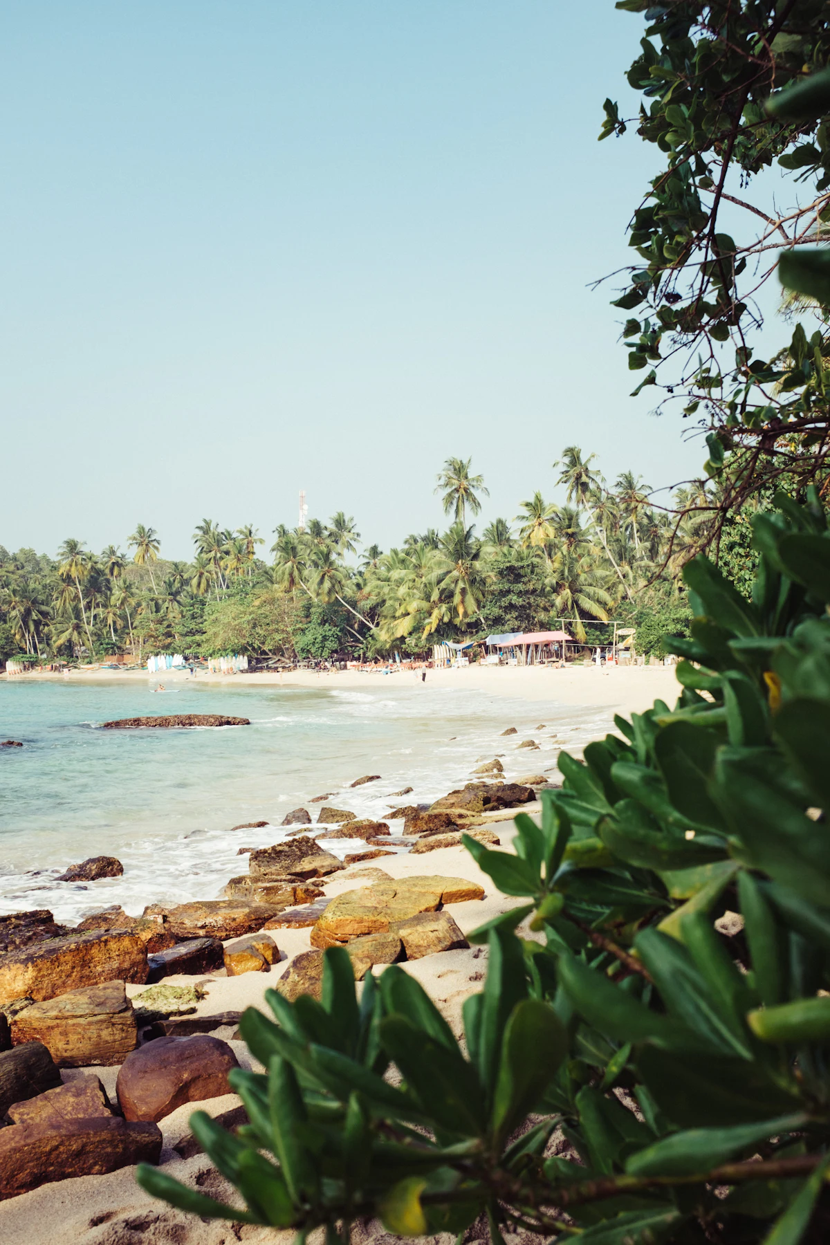 A shallow lagoon meeting the shoreline