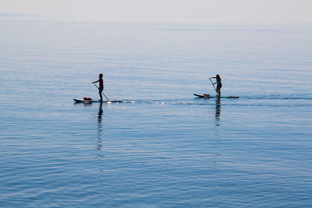 photo of West Bay Stand up paddle surfing near Chesil Beach