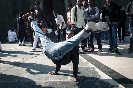 man doing break dance in Shaniwar Wada India