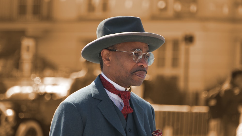 man wearing blue formal suit jacket