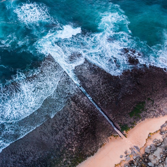 areal photography of a body of water in Ericeira Portugal