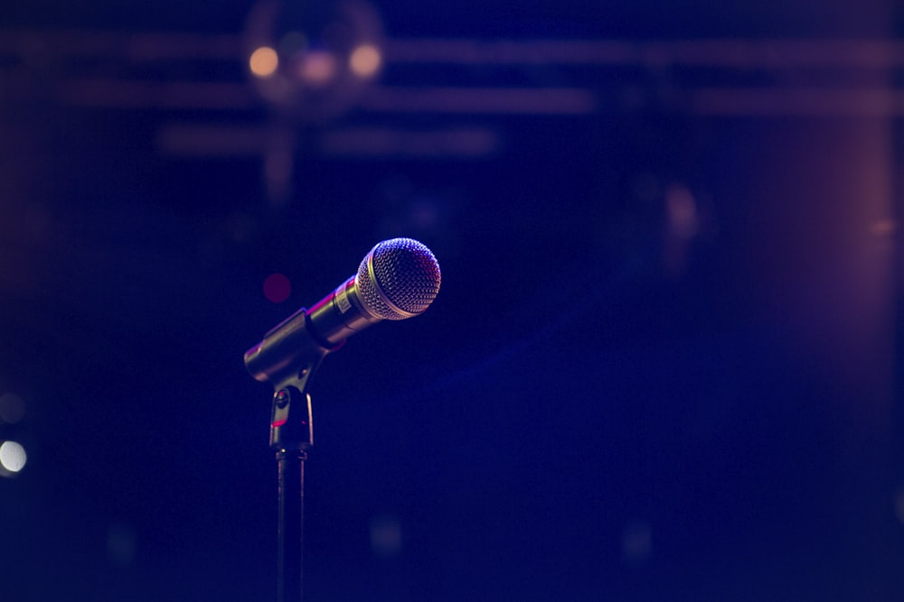 black and gray microphone on black stand