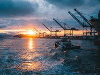 oil rigs on body of water