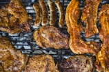top view photo of grilling chicken and bacon