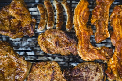 top view photo of grilling chicken and bacon