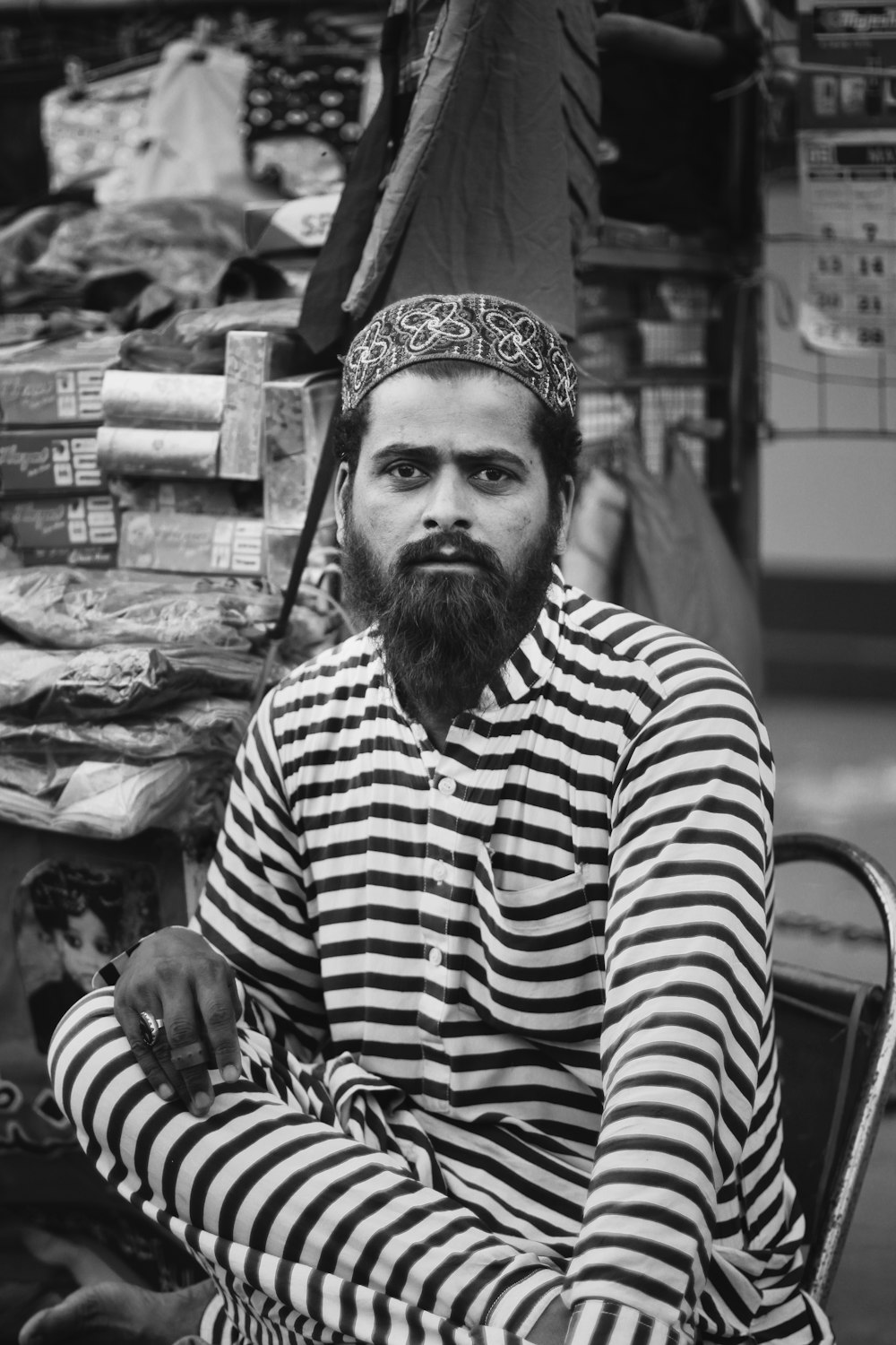 man sitting on black chair