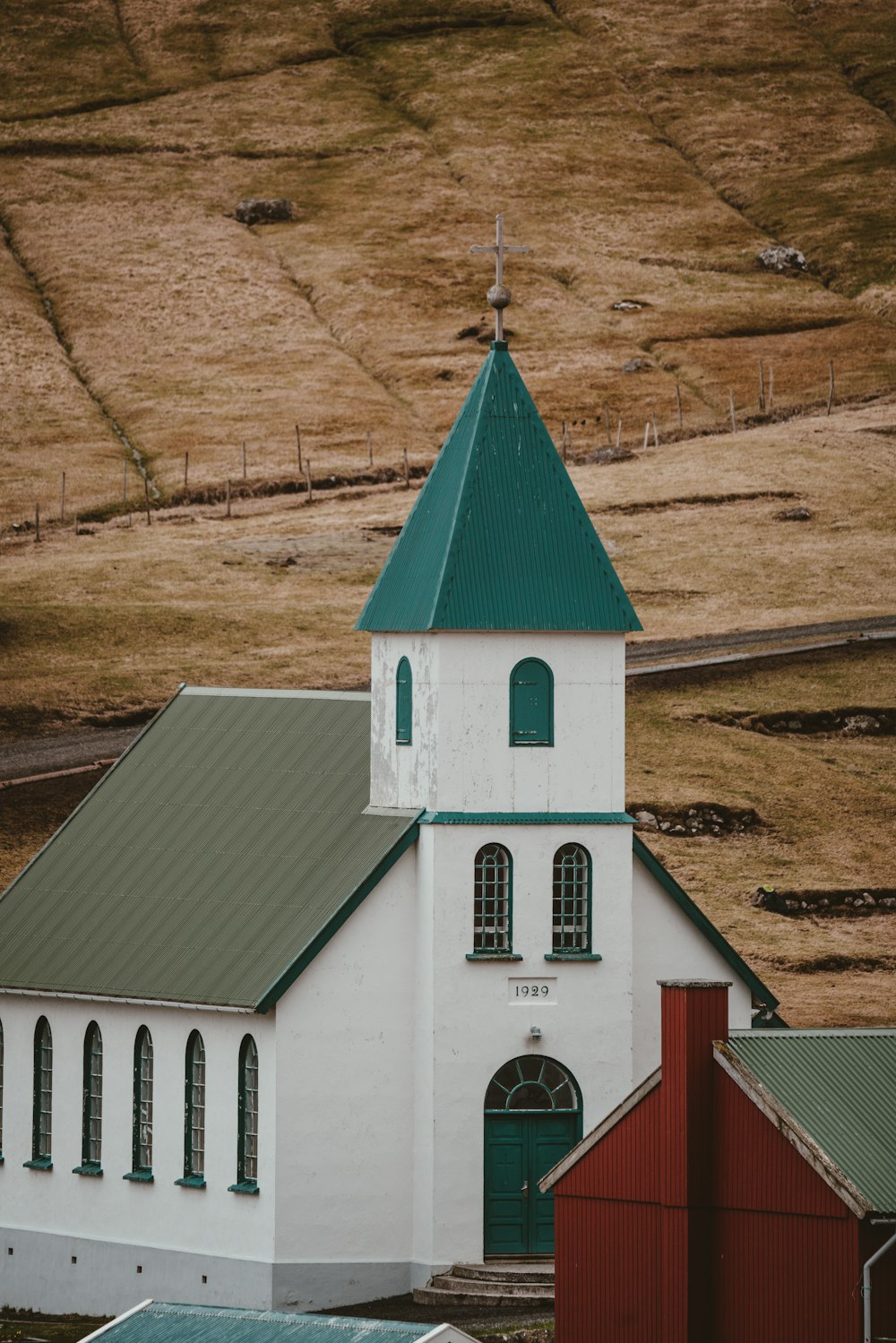 photo of white and teal church