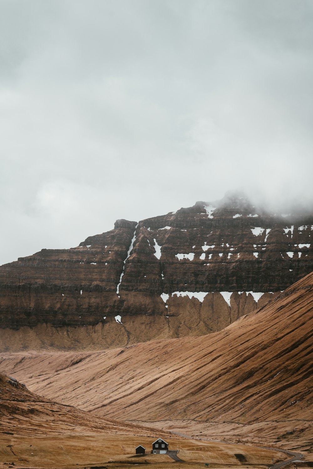 photo of mountain covered with mist