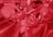 a close up of a red liquid substance