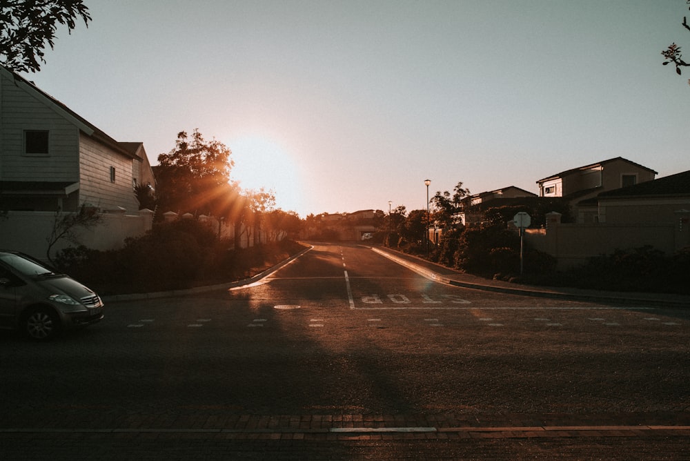 silhouette of houses during golden hour