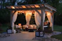 photo of gazebo with curtain and string lights
