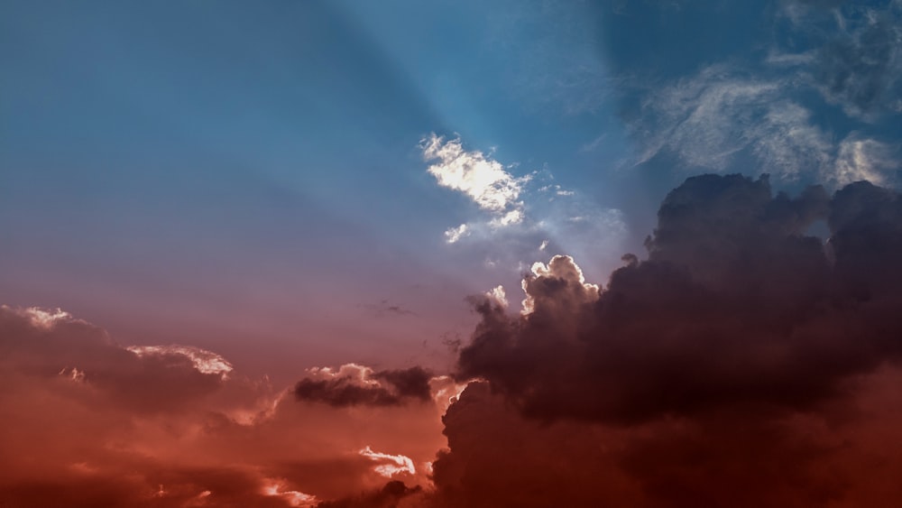 sun ray coming behind clouds