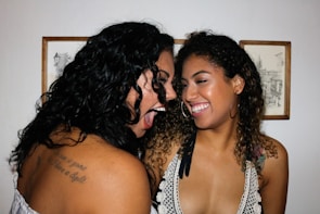 Two people exchanging smiles during a lively online video chat on newmulakaat.