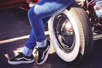 person wearing blue denim jeans