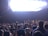 A crowd cheering during a xavier concert.