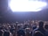 A crowd cheering during a xavier concert.