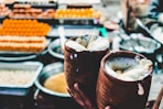 a close up of a person holding a pastry