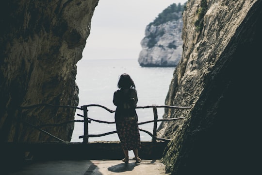 woman looking at sea in Minorca Spain