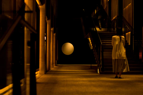 Elevator and corridor lighting setup in a condominium.