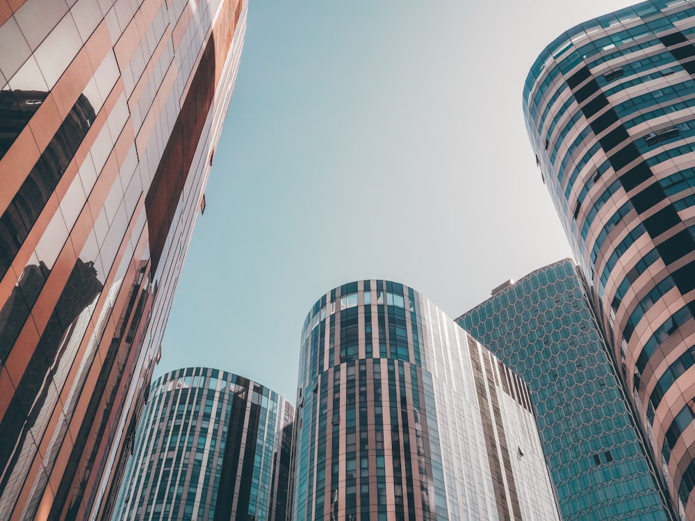 glass buildings under blue sky during daytimne