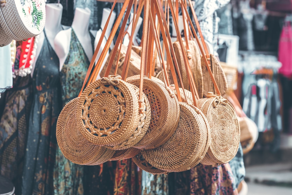 round brown woven sling bags