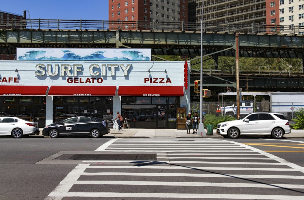 Surf City store beside train tracks and road