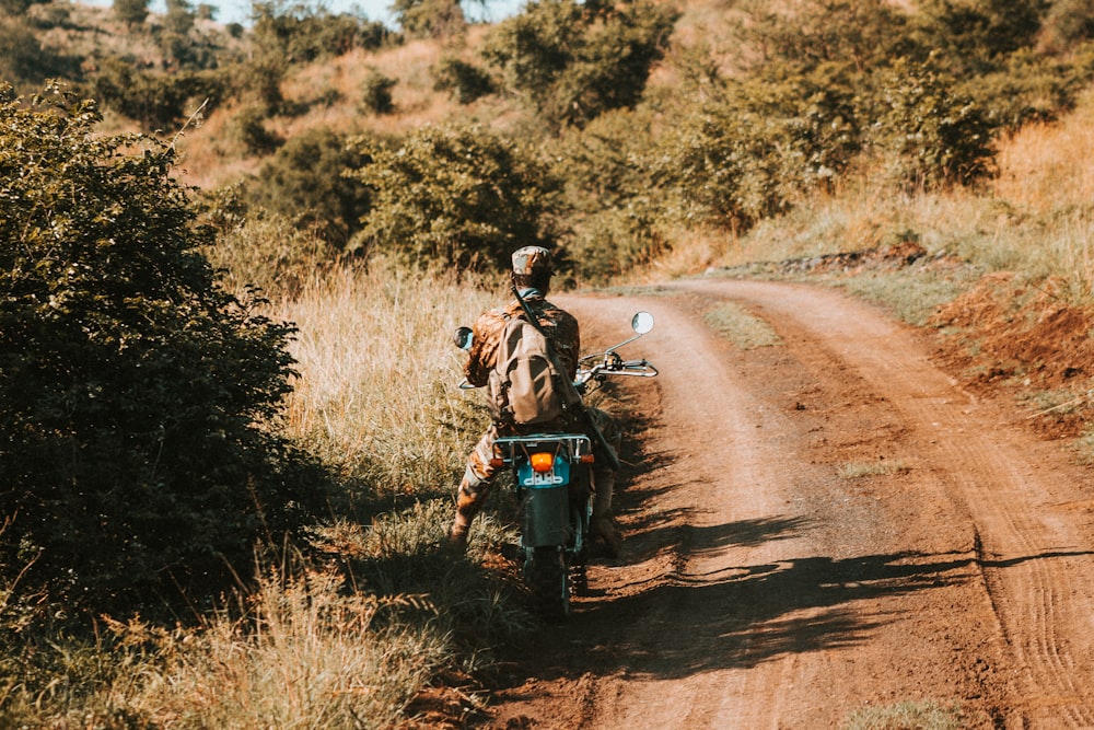 person riding motorcycle during daytime