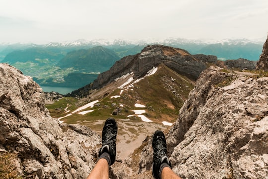 photo of person on mountain in Mount Pilatus Switzerland