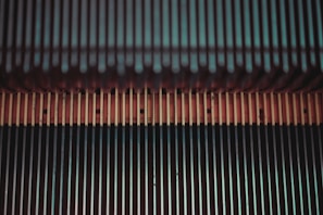 Close-up of the linear drive mechanism powering the stairlift robot on a modern staircase