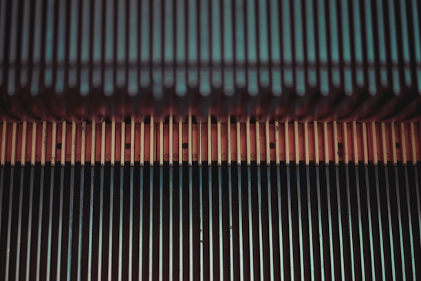 Technician from liftx performing maintenance on an escalator in a commercial center.