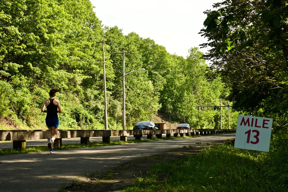 person running near road