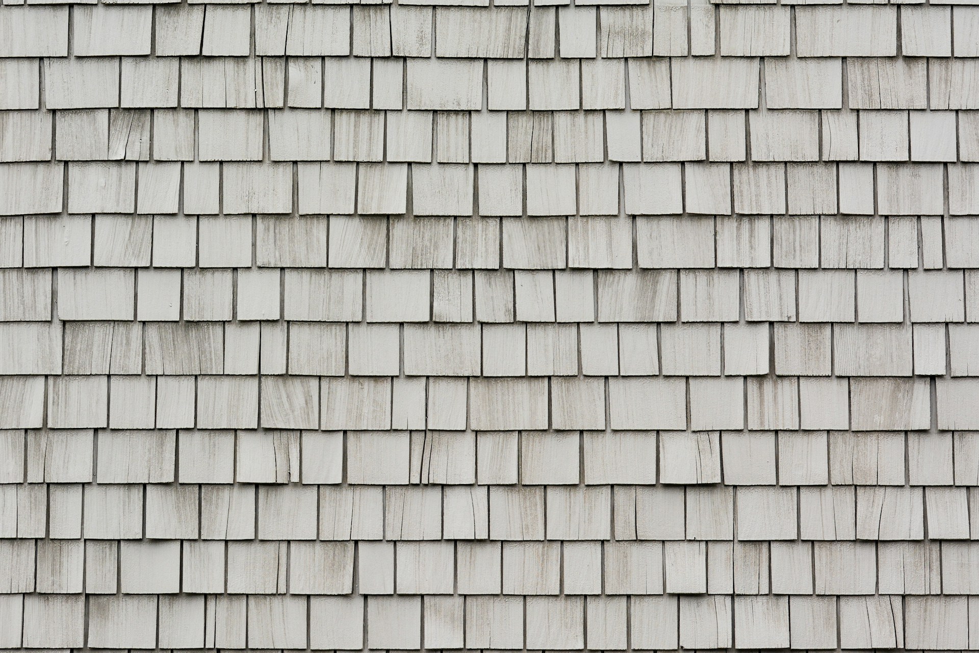 closeup photo of gray roof shingles