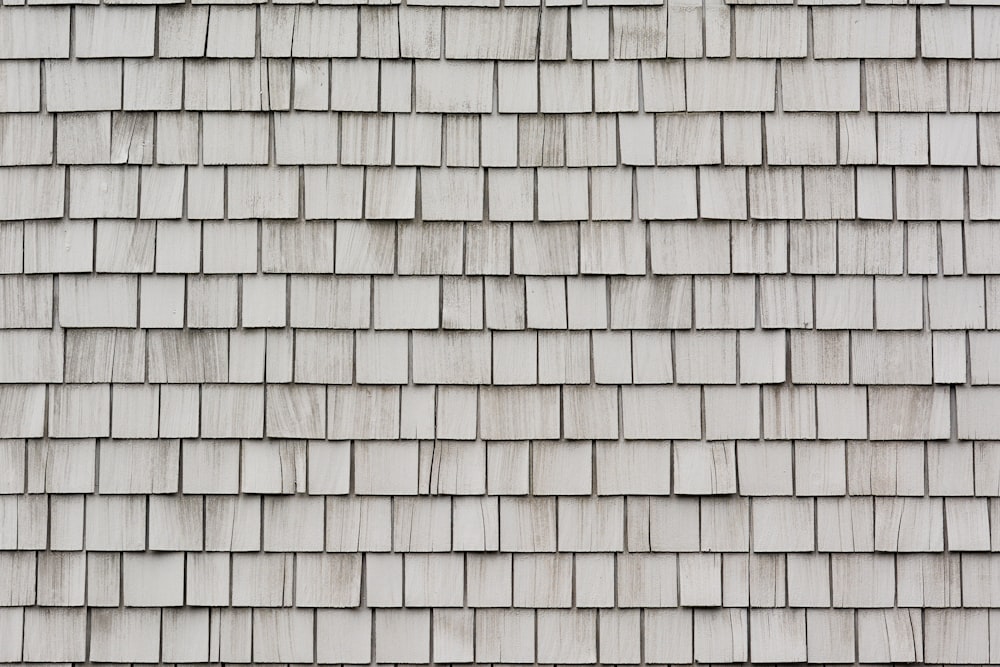 closeup photo of gray roof shingles