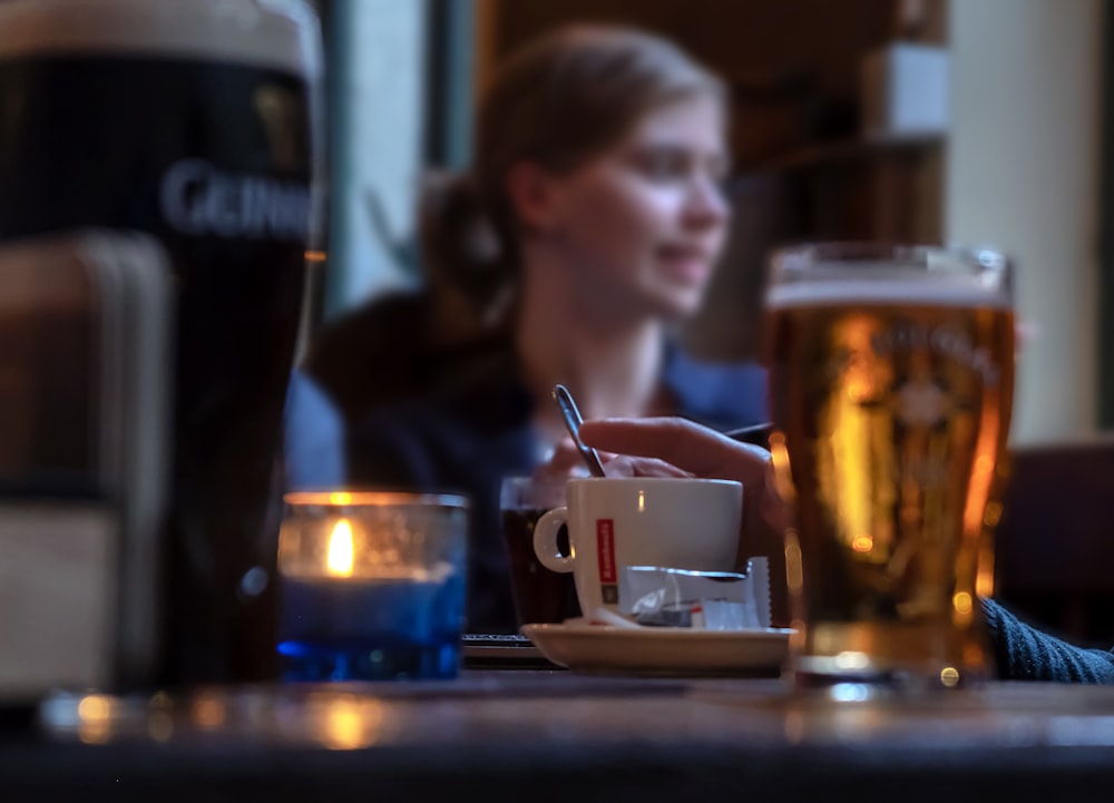 woman sitting on chair near table