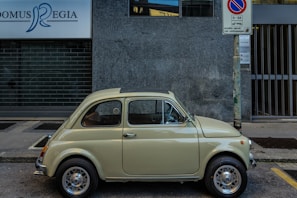 A modern Fiat Mobi parked in an urban setting.