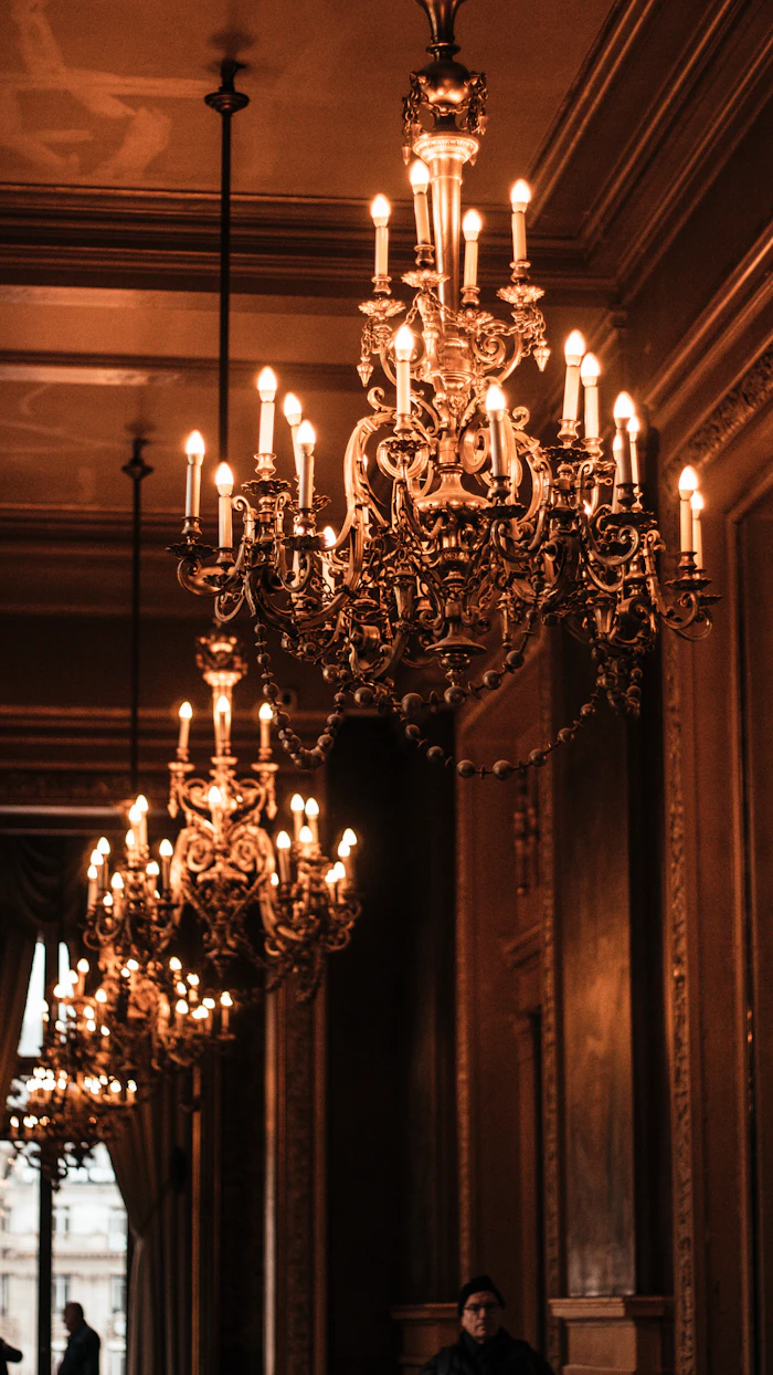 Grand salon with ornate chandelier prepared for a gala