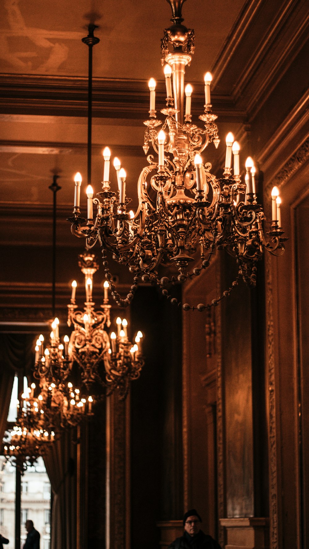 lighted brown and black uplight chandelier