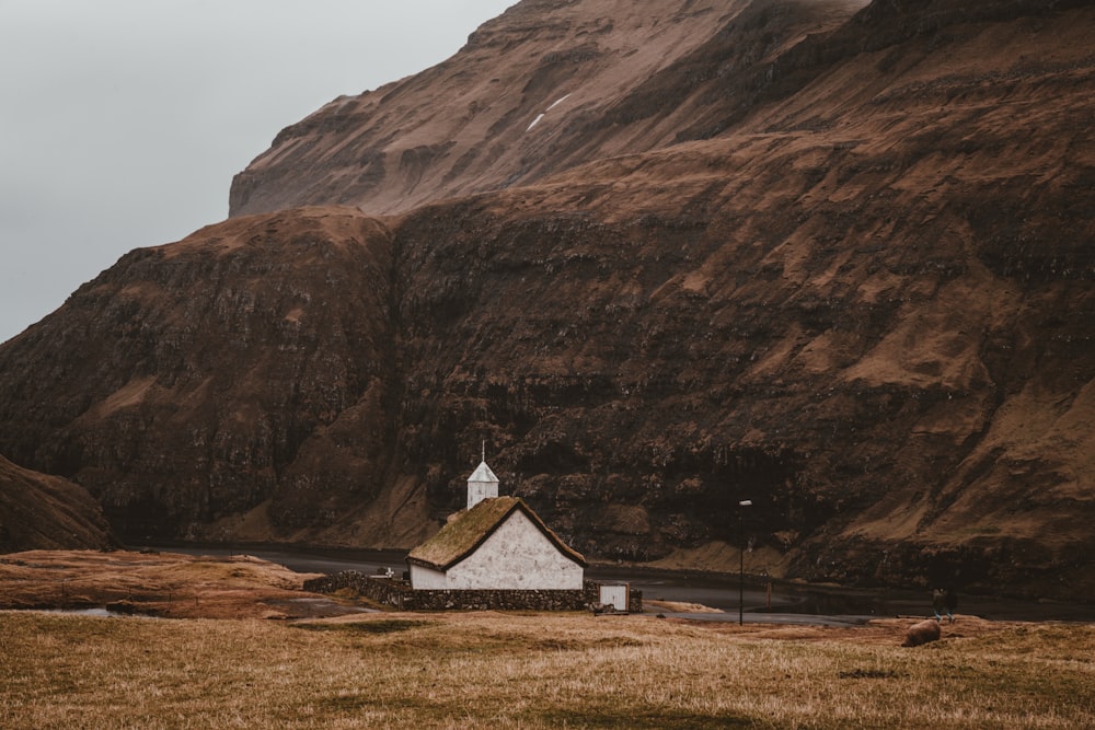 white chapel near mountain